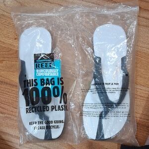 Reef Black and White Flip Flops